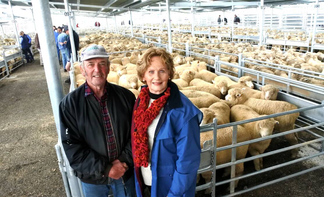 Vendors Ken and Sue White from Yass donated a sheep that raised $200 for the Yass Hospital Auxiliary and sold the first pen of the day for $137. Photo by Jessica Cole. 
