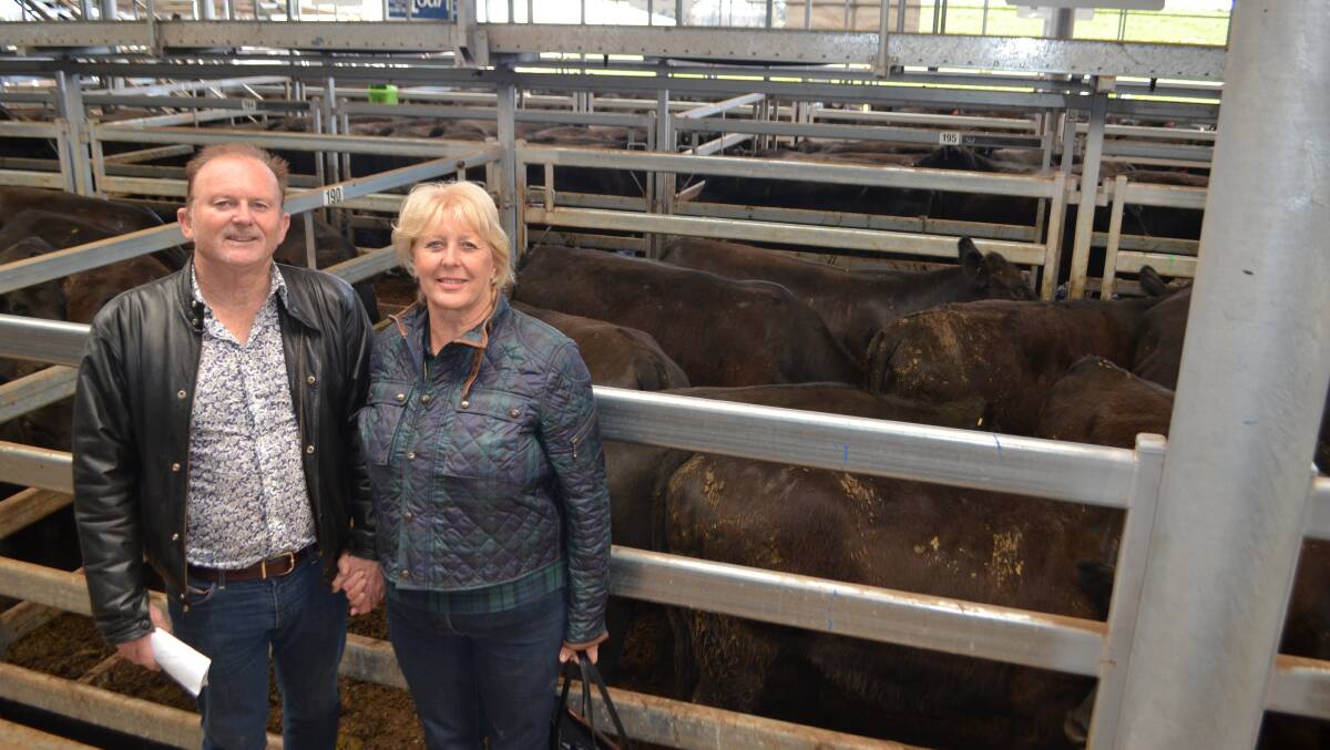 John and Pam Farragher, Seaham via Maitland, with the pen of 15 PTIC Angus heifers,  20-22 months and weighing 521kg for which they paid $2700.
