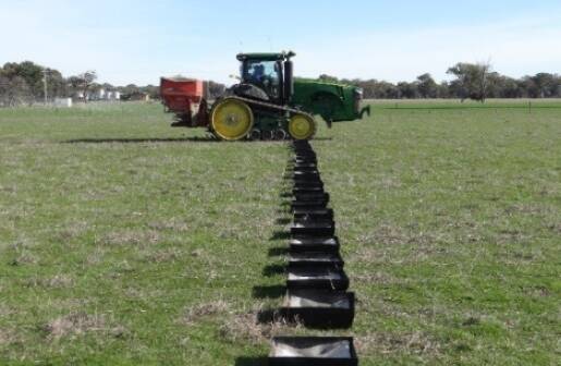 Nitrogen application: using catch trays to calibrate nitrogen application in trial at Rutherglen. Photo: supplied.