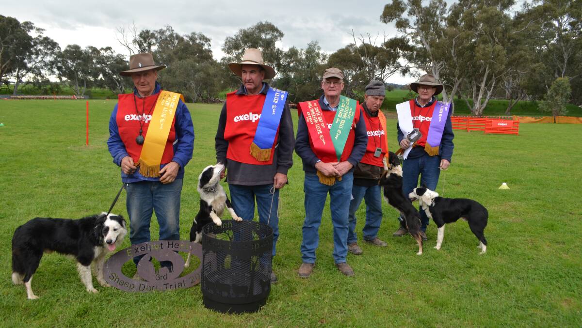  Paul Elliott, Eumungerie, with his dog Georgie winner of the Exelpet/Pedigree Henty Sheep Dog Trial, with (left to right)  - Colin Reid, Glenrowan, Vic, 3rd with Monet, Paul Elliot, Eumungerie, 1st with Georgie, John Perry, Bredbo, 3rd with Jazz and 6th with Jim, Laurie Slater, Murrumbateman, 5th with Jewels, and Charlie Cover, Yass, 4th with Bashfords Herbie and 7th.