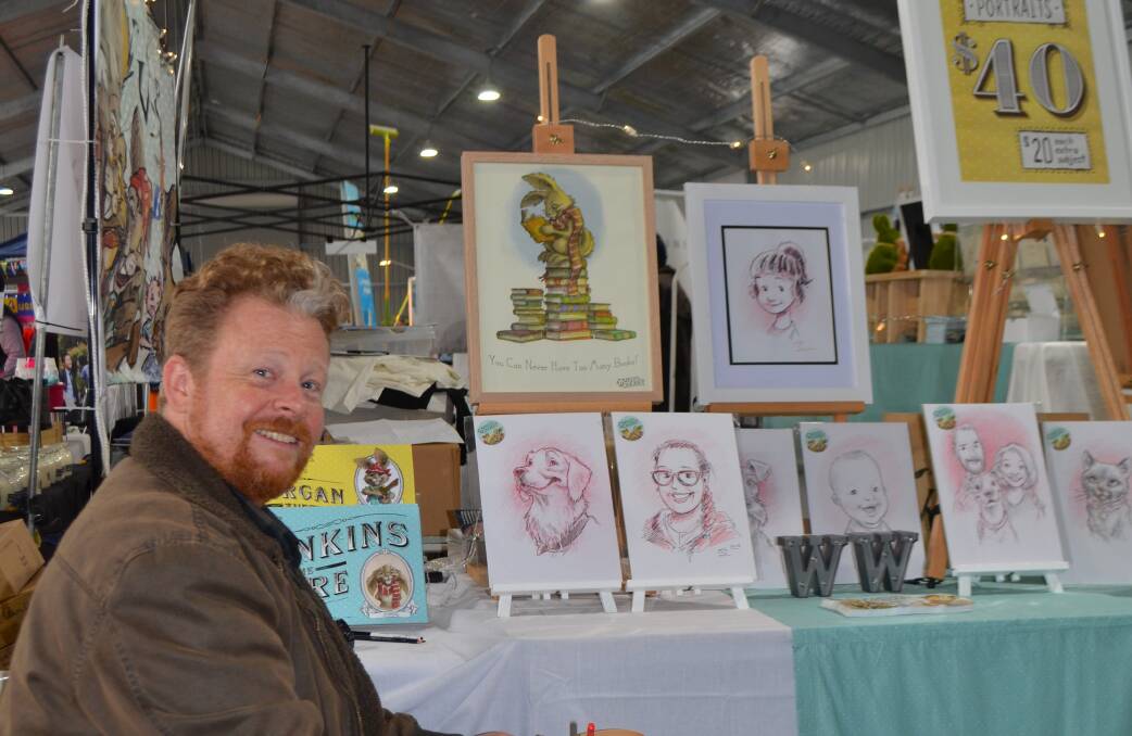 Animator Adam Murphy took time to visit the Henty Field Days and create caricatures in the Lifestyle Pavilion.