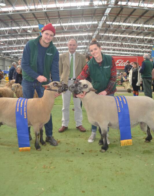Malcolm Bloedell, judge James Bond, Cornwall, UK, and Julia Chapman, with the champion Dorset Downs ewe and ram, bred by Colin and Margaret Chapman, Woodhall stud, Wedderburn.
