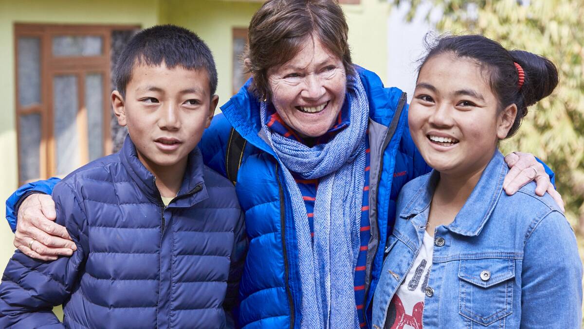 Care: Border nurse Trish Ryan has helped Nepalese children like Bibesh and Malina Rae, rise above poverty through her Meg’s Children Trust. The trust will hold a gala fund raiser at the Albury Club on March 31. Photo: supplied.