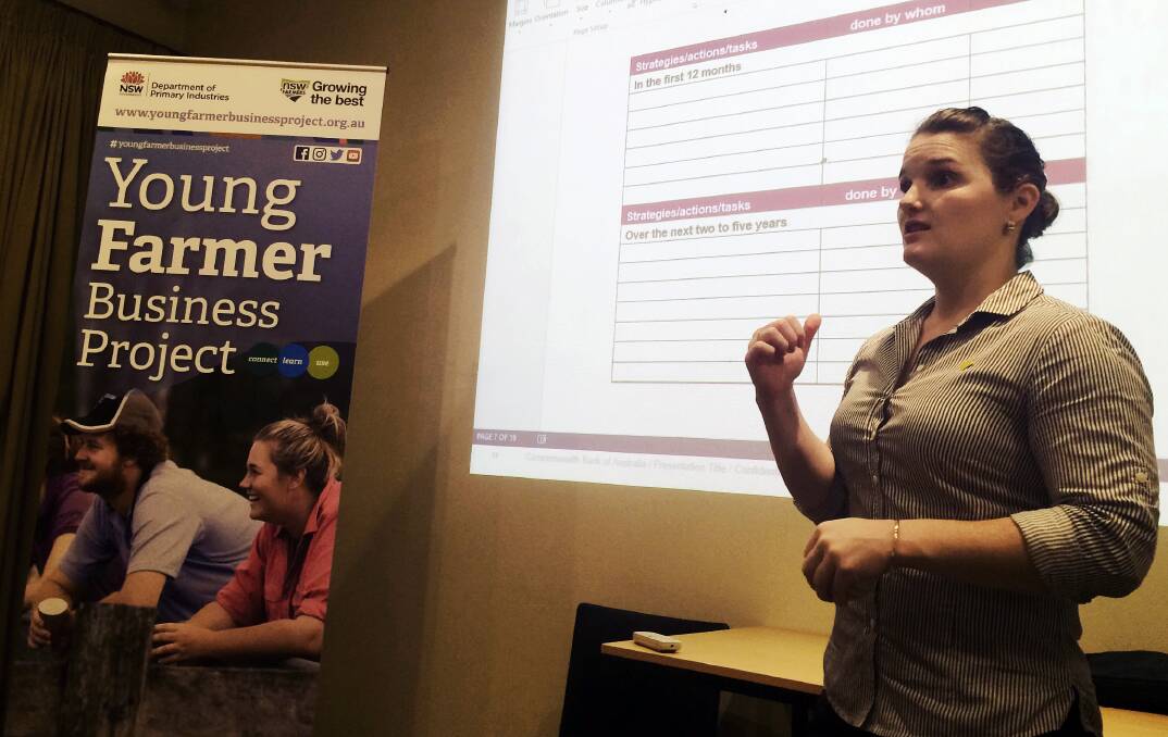 Banking: CBA agribusiness specialist, Jessica Newton, takes young farmers through their financial paces at a Bank Ready workshop in Barraba - more than 240 young people have participated in the Young Farmer Business Program to develop financial skills and learn more about rural finance processes. Photo: supplied.