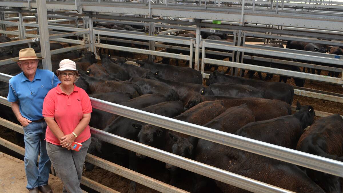 Graeme and Dawn Macaulay, "Teviot Dale", Huon, Victoria, with their pen 25 Angus steers, 8 to 10 months, weighing 362kg and sold for $1415.
