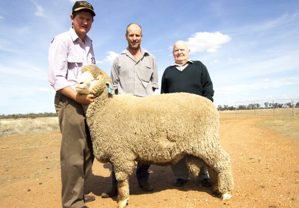 Stuart McBernie, Weealla Merino with the McIntyre family who purchased the top priced ram.