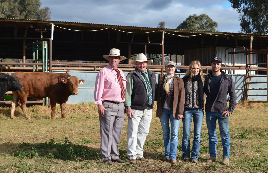 Brain Kennedy, Elders Livestock, John Settree, Landmark Stud Stock, Dawne Hunter, co-principal Bald Ridge Wagyus, Abigail Hunter, Matt Skinner with the top-priced bull.