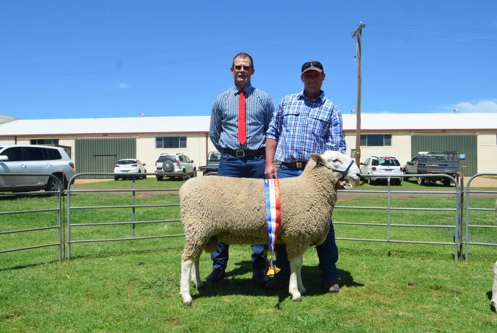 Judge, Murray Brown, from Glamis Border Leicester stud, with Jamie Buerckner, Bauer Border Leicesters, and the champion ram of the show.
