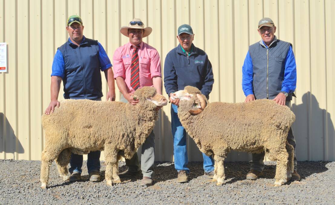 Buyers of two $2800 top-priced rams Stephen and Trevor (left) Cooper, TH Cooper and Co, Caragabal, with auctioneer Aaron Seaman, Elders, and Rocklyn Merino studmaster Ralph Diprose, Greenethorpe. Photo: Hannah Powe 