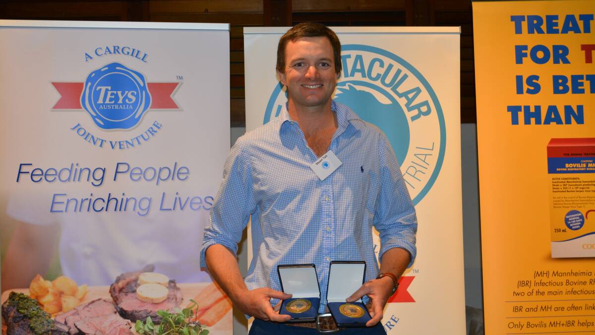 Stuart Tait from Tait Pastoral Company, Sunny Downs, Mandurama, accepts the two gold medals for eating quality their teams secured in the 2020 feedback trial. They also were ranked 1st and 2nd for average team MSA Index. 
