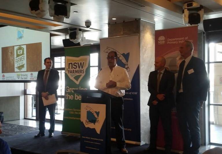 Last year's NSW Farmer of the Year, Port Stephens Barramundi producer Nick Arena, with NSW Farm Writers' President Ben Craw, Minister Niall Blair, and NSW Farmers president Derek Schoen. This year's prize will be awarded on December 11. 