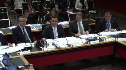 Deputy Premier John Barilaro, centre left of the picture, at Budget Estimates this afternoon. Photo from the Parliamentary webcast. 