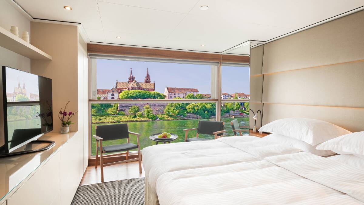Relax in the spacious Emerald Balcony Suite on your Evergreen river cruise.
