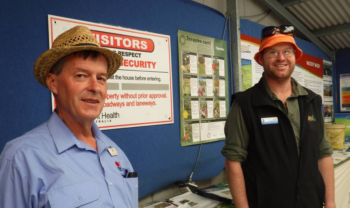 NSW Primary Industries Department invasive species officer Michael Michelmore and City of Wagga Wagga vegetation management officer Christopher Tolman at the Henty Machinery Field Days.