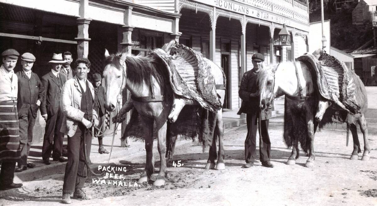 Woodward Food's supply chain is now a slick operation, yet family control has been maintained right down to moving cattle and carcases. Robert Woodward's grandfather is the butcher on the far left in this archival photo. 