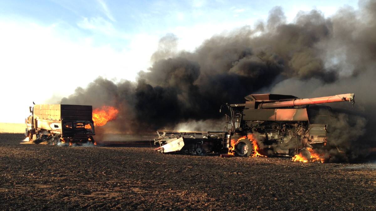 A spate of harvesters burning to the ground in the past year has grabbed the attention of insurers, who are now taking a harder line on the machines. This harvester caught fire in October last year.