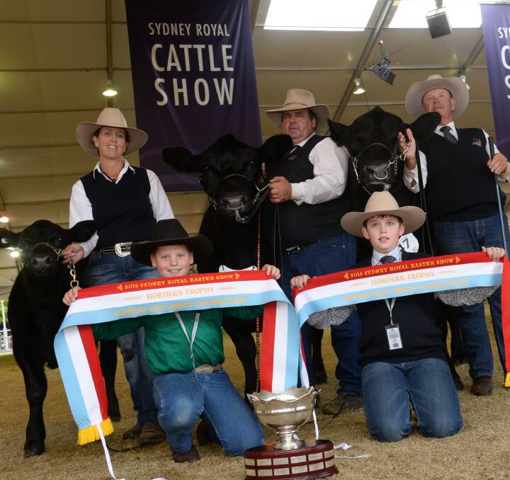 Hordern Trophy winners from Allora, Queensland, handler Leanne Neilsen and Steve Hayward, Richard Duddy, Killain Angus Stud, Tamworth, and (at front) Thomas, 9, and Benjamin Duddy, 11, at the Sydney Royal Show.