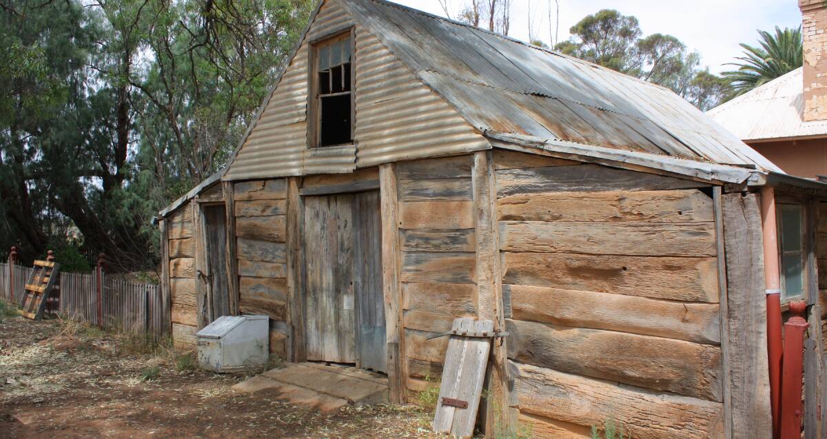 The original red gum slab cottage beside the Lachlan, built in 1834 by James Phelps, still stands, part of the 'Oxley' homestead complex.