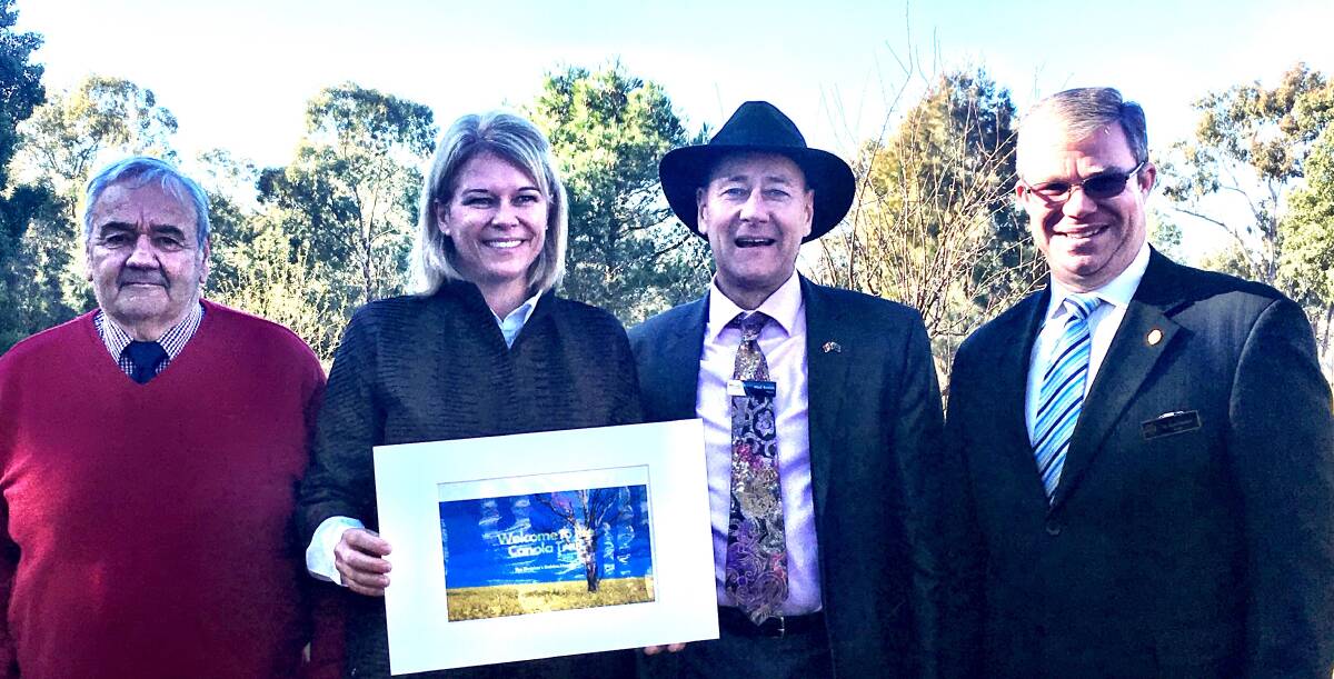 The Hon Katrina Hodgkinson had the honour of launching The Canola Trail at Lashbrook Farm, Old Junee. Ms Hodgkinson is pictured with the mayors of the three councils collaborating in this marketing campaign, John Seymour (Coolamon), Neil Smith (Junee) and Rick Firman (Temora). Photo by Pennie Scott.