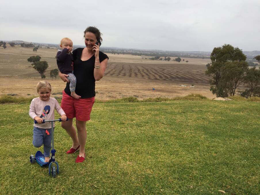 Founder of Go Remote, Joanna Palmer, The Rock, near Wagga, with daughters Matilda and Anthea, provides the connection between employers and professional skilled staff across Australia. "With the available communications technology, anyone can work from anywhere in real time. The options now available mean considerable savings in operations when people do not have to travel to a single location,' she said. Photo by pennie scott