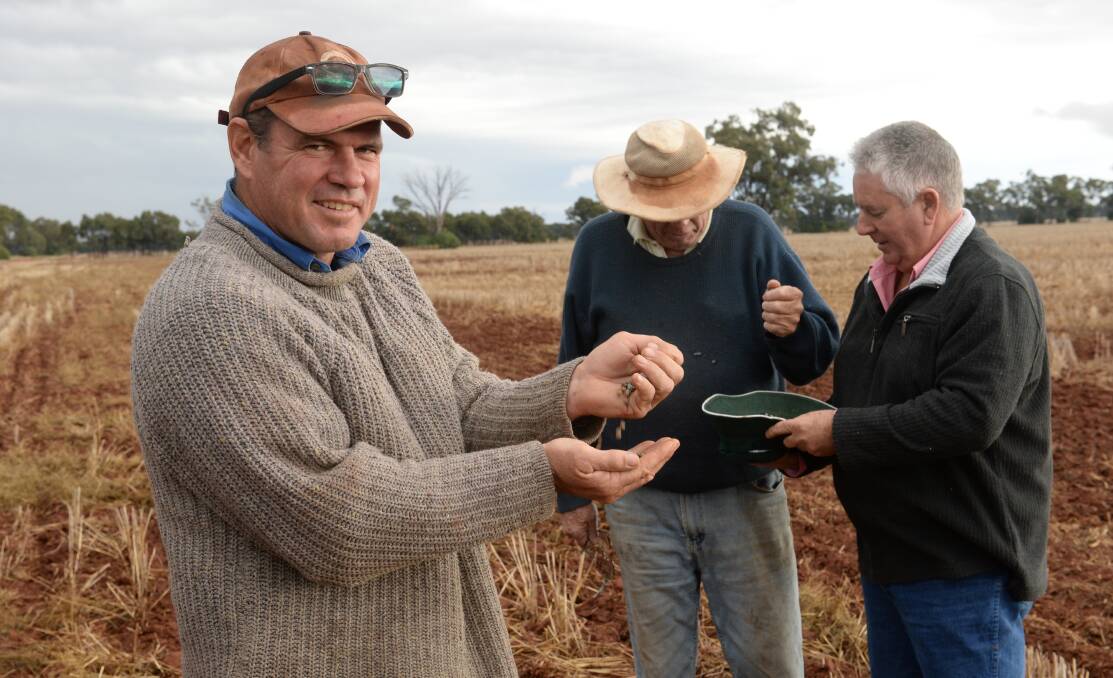 Simon Ward, 'Thorndale', Nyngan with his father David Ward and Elders Nyngan agronomist, Wayne Judge in a paddock sown to chickpeas.
