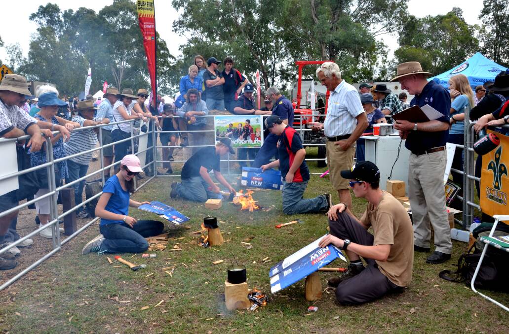 SMOKING: All that smoke and still no boiling water - the billy boiling competition at Tocal Field Days proved very popular. 
