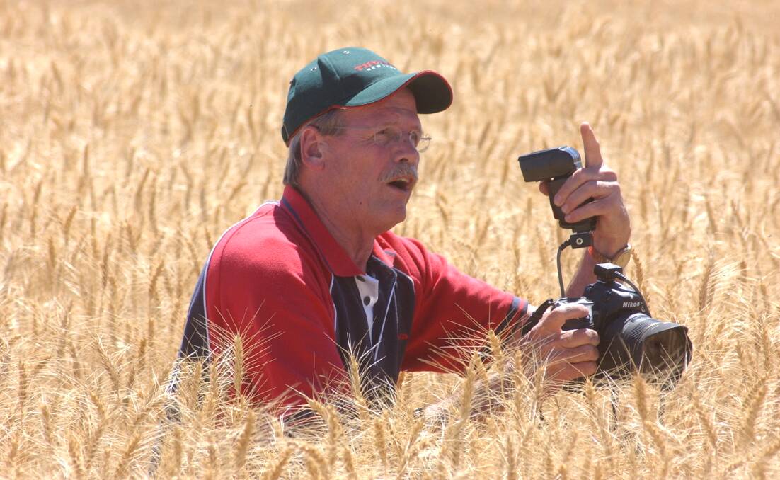 The Land's now retired chief photographer Michael Petey on assignment at "Napier Downs", Coonabarabran, during the November, 2006, harvest.