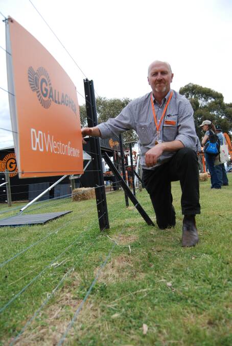 Gallagher territory manager, Matt Smith, demonstrates the Westonfence off-set ground attachment designed to prevent animals digging under the fence.