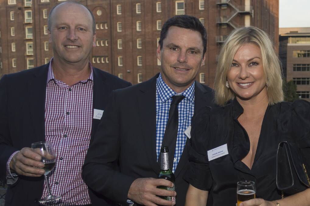 Ian Perry, RuralCo executive general manager financial services, David and Danielle Statham, Sundown Pastoral Company.