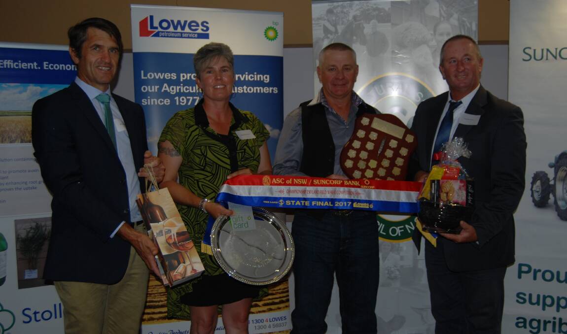 Bill Williamson, Suncorp Bank, Dubbo, with state winners, Michael and Natalie Wilkinson, Stockingbingal Pastoral Company, "Netherby", Wallendbeen, and Lowes regional depot manager, Brendan Munn, Moree.