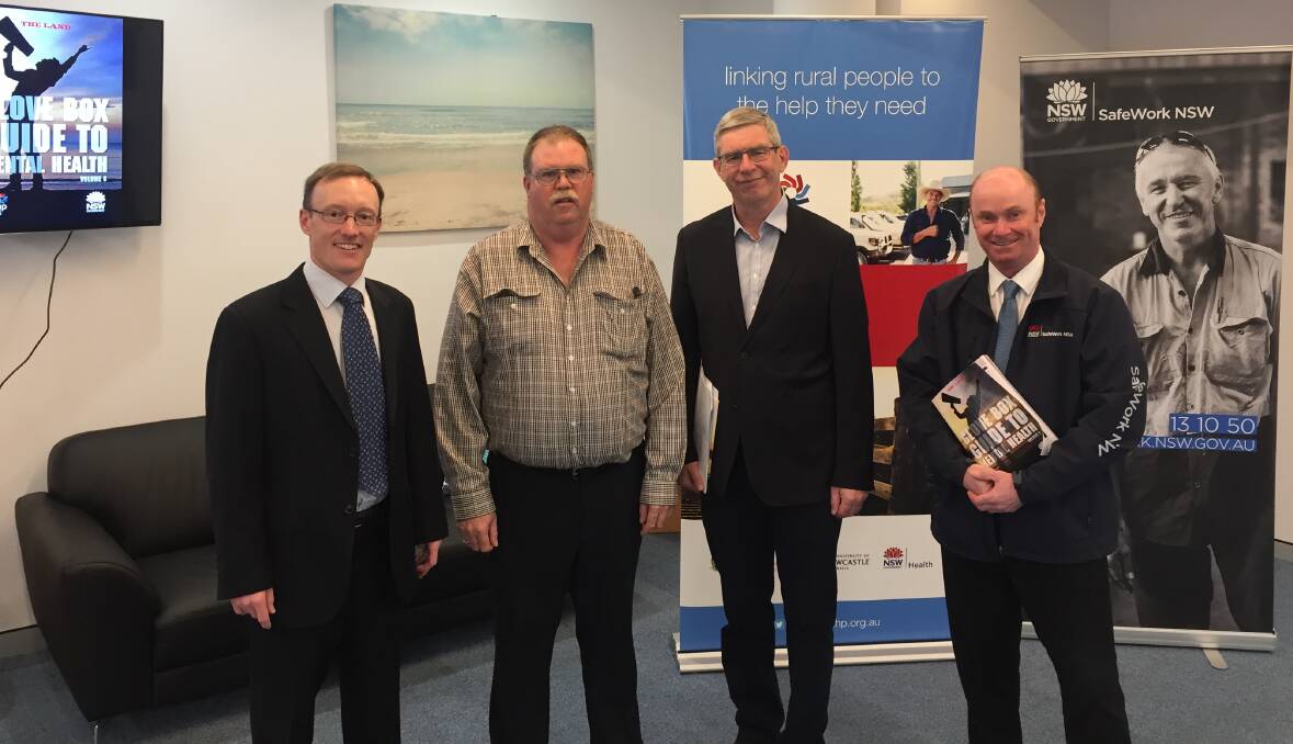 The Land's editor, Andrew Norris, at today's launch of the sixth edition of the Glove Box Guide to Mental Health with presenter, Glenn Constable, Bedgerabong, director, Centre for Rural and Remote Mental Health, Professor David Perkins, and group director, regional operations and sector initiatives, SafeWork NSW, Tony Williams.