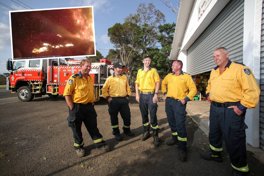 Teamwork: Dunmore RFS members Les Millier, Greg Hardy, Daryl Kimmins, Cameron Chisholm and Tim Anderson worked well together to remain safe when the Currowan fire front rolled over their truck. Picture: Adam McLean