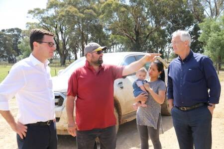 Anthony and Isla Peating, Toolamba, Vic, show Agriculture Minister David Littleproud and Member for Murray Damian Drum around their farm.