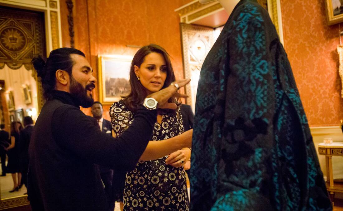 HRH The Duchess of Cambridge with designer Bernard Chandran and his design that features oriental embellishments created with wool.