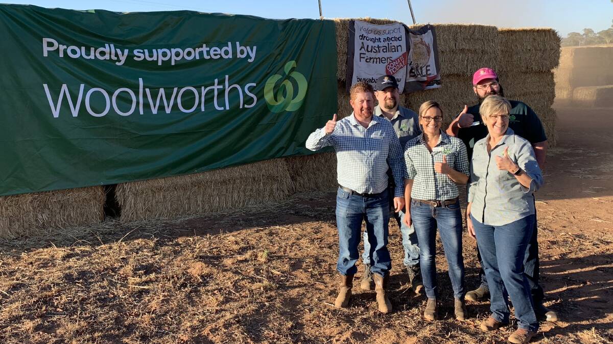 A hay drop of 800 bales at Binnaway last Friday that was organised by Rural Aid and sponsored by Woolworths. Photo by Rural Aid.