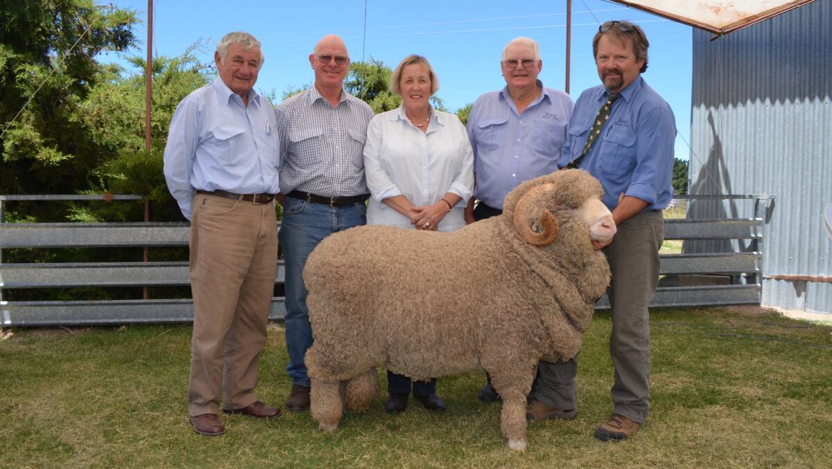 Buying agent Peter Meakes, AWN Newcastle, buyers Tony and Janet Gall, Wilson's Creek Merinos, Uralla, Westvale Merinos principal Leo Blanch and overseer Scott Matthews with the $7750 ram.
