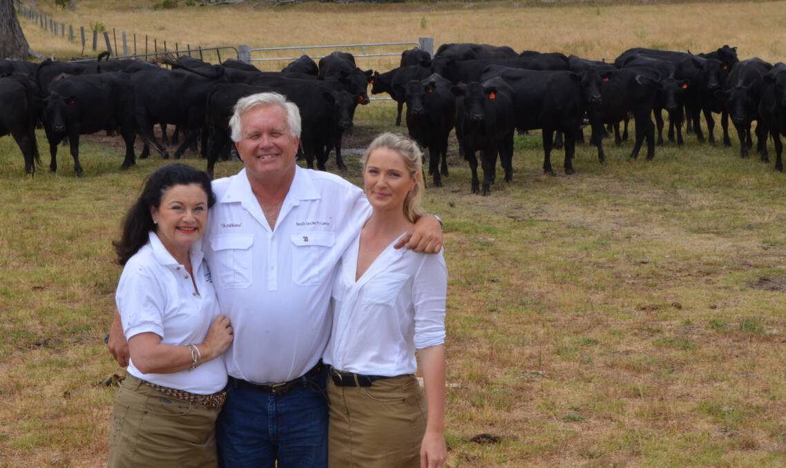 Margot and Breck Johnston and Georgie Copeland with Angus cattle at "GlenBarra", Manilla. The family produces pure Angus weaners that are sold through the Tamworth saleyards during autumn weaner sales.