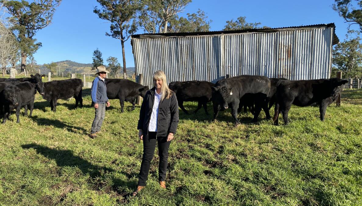 FEMALE FOCUS: Amanda Harris and farm manager Leo Dillon with Angus heifers and a Knowla Angus bull at Ardcheil, Gloucester. 