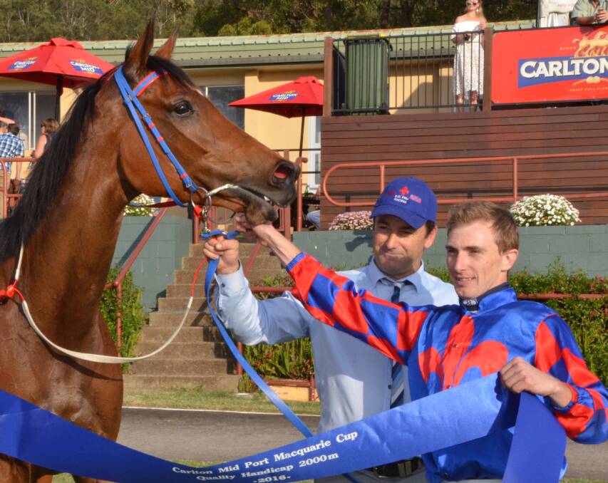 Sofin with trainer Shannon Fry and jockey Ben Looker after winning the $100,000 Carlton Mid Port Macquarie Cup last Friday. 