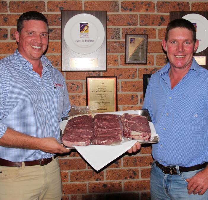 JBS Australia's northern sales manager Brendan Tatt with stud and commercial Shorthorn producer Jason Catts, Futurity Shorthorns, Baradine and some of the Shorthorn beef at the recent producers day held at Tamworth.
