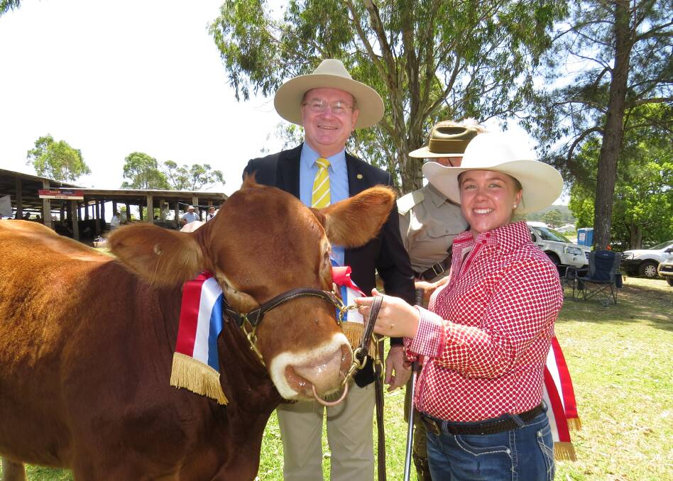 Myall Lakes MP Stephen Bromhead and 2016 reserve beef exhibit, Warrigal Black Caviar, led by Rachel Relf, Warrigal Limousins, Wingham.