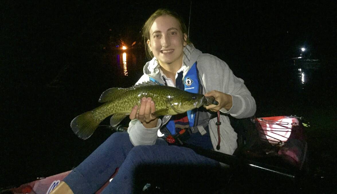 Mackenzie Smith with a nice little Murray Cod caught while night fishing in the kayak.