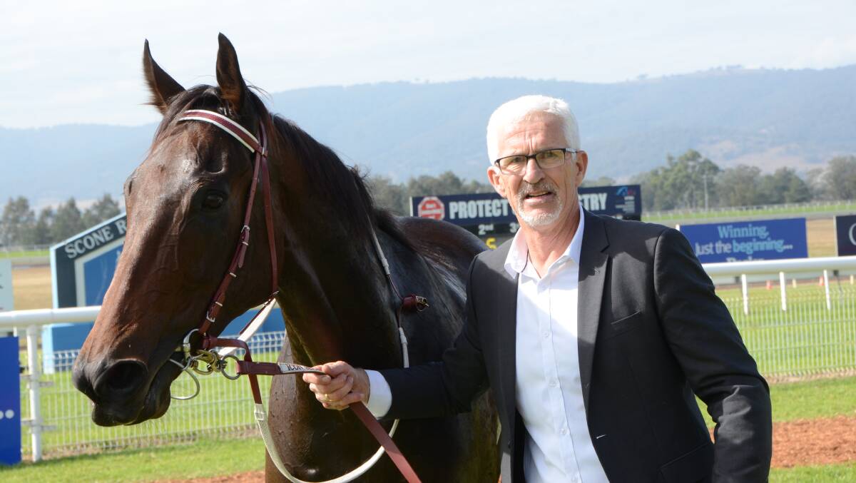 Albury trainer Andrew Dale with Lautaro, who beat the fancied city slickers to win the staying event over 2200 metres at Scone last Saturday.