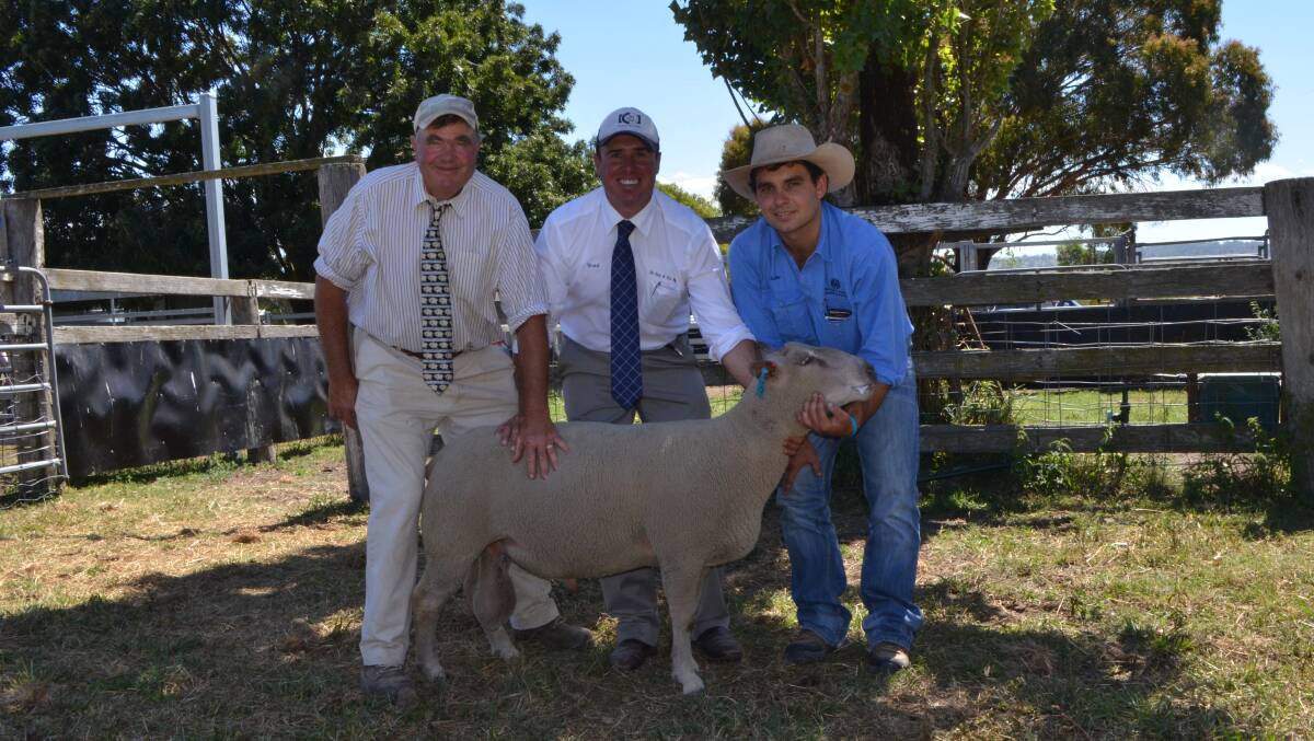 Camlea Charollais stud principal Kevin Feakins, selling agent Shad Bailey, Colin Say and Co, Glen Innes, and buying agent Luke Heagney, Armitage and Buckley, Armidale, who purchased the top ram on behalf of Warren Coventry, Lynoch Pty Ltd, Armidale.