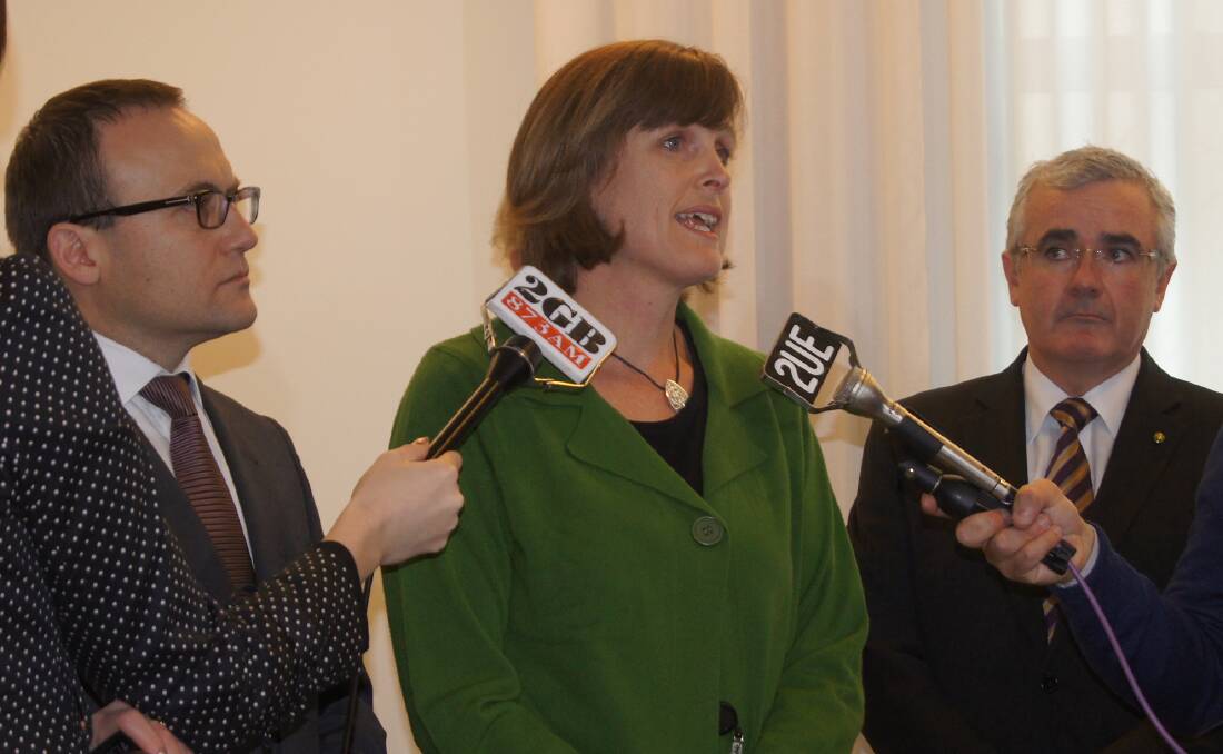 RSPCA Chief Scientist Dr Bidda Jones (centre with Greens MP Adam Bandt and Tasmanian Independent MP Andrew Wilkie.