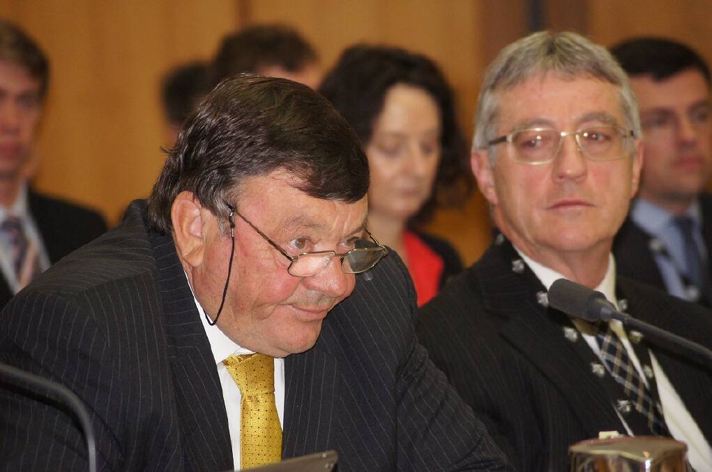 Australian Wool Innovation (AWI) Chair Wal Merriman (left) and Agriculture and Water Resources Department secretary Daryl Quinlivan at Senate estimates hearings in Canberra last October.