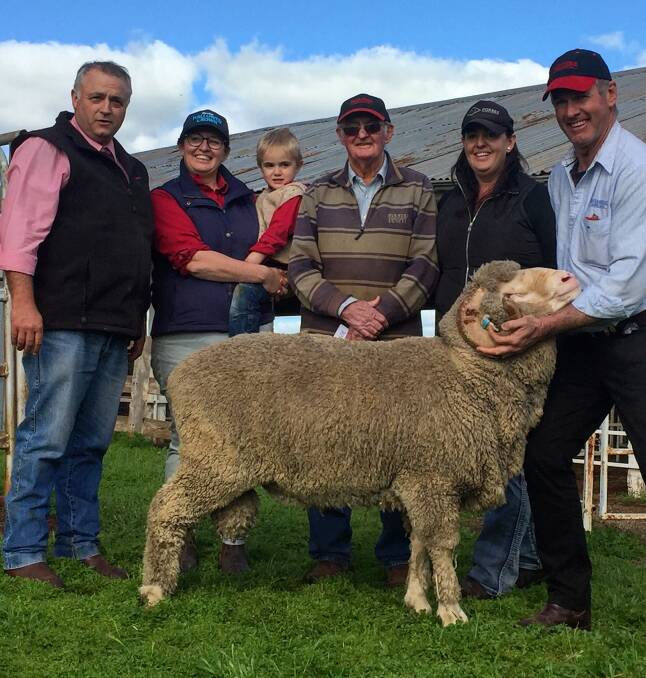 Scott Thrift, Elders, Dubbo; buyers of the $2800 sale-topper, Fiona and Jim Aveyard with Ian Williamson,Felicity Williamson and Genanegie stud principal Stephen Swain.