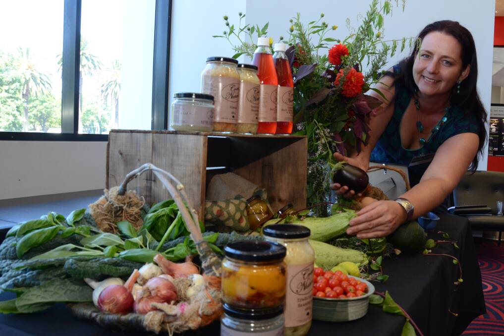 Christine Corner of Crave Natural, Mudgee, shows off the many varieties of permaculture and vegetable fermentation products grown in her Market Street garden near Mudgee’s Town Centre.