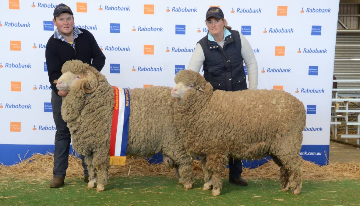 Langdene stud, Dunedoo, exhibited the Max Smith Trophy winning Merino pair August shorn held by Ben Simmons and Lauren Crothers.