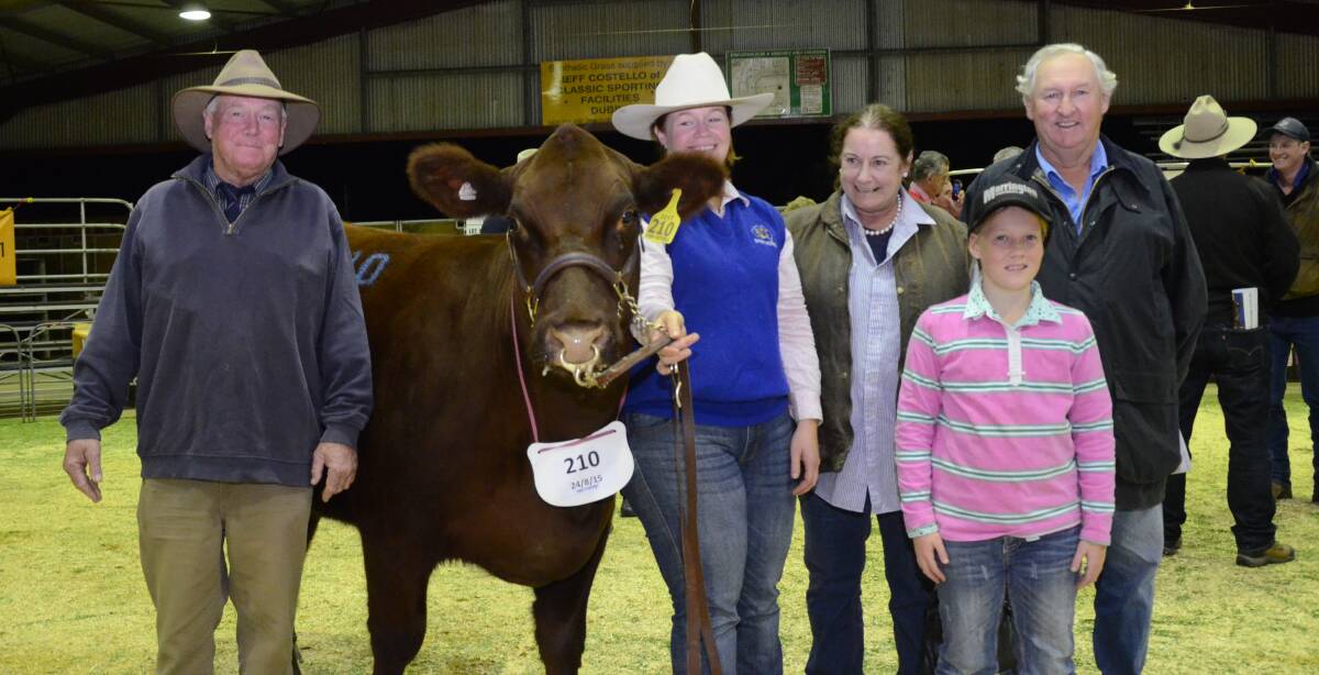 The $6250 top-priced heifer of the 58th Dectomax Dubbo National Shorthorn Show and Sale, Marrington L66 with breeders Howard Williams, daughter Debbie O'Connor and grand-daughter Evie O'Connor, Marrington stud, Dubbo; and buyers Susan and Dougal McLeish, Thurn Shorthorns, Quambone.
